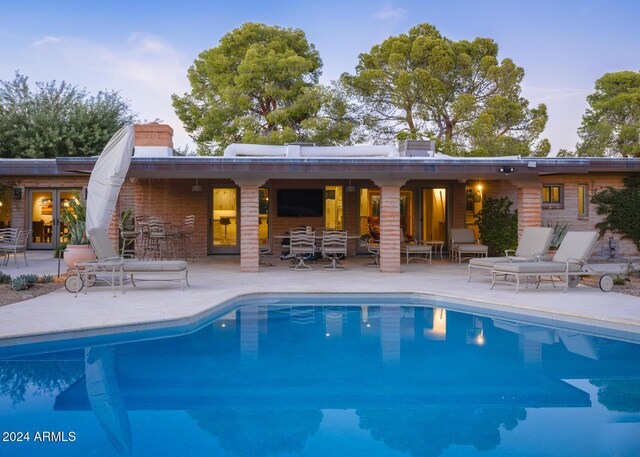 view of pool with a patio area