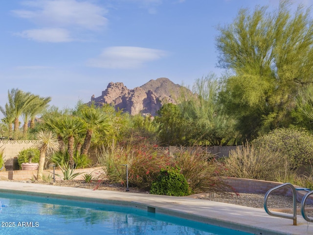 view of pool with a mountain view