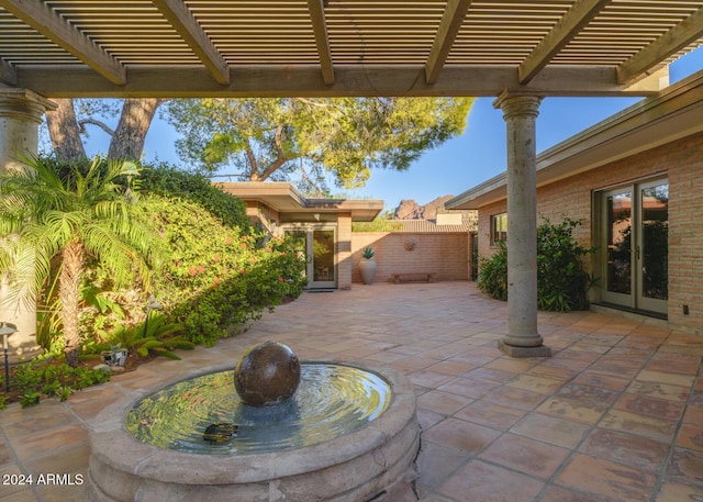 view of patio featuring a pergola