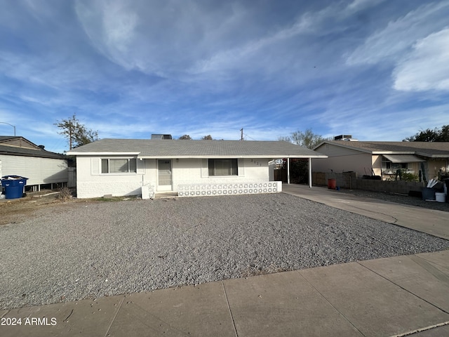 view of front facade featuring a carport