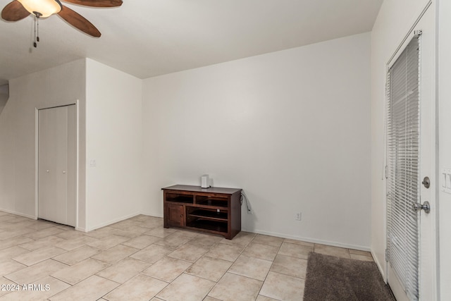 unfurnished bedroom featuring ceiling fan