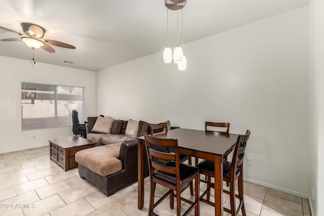 dining area with ceiling fan