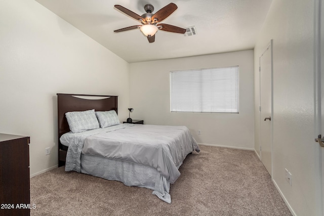 bedroom featuring ceiling fan and light carpet