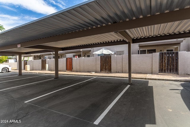 view of car parking with a carport