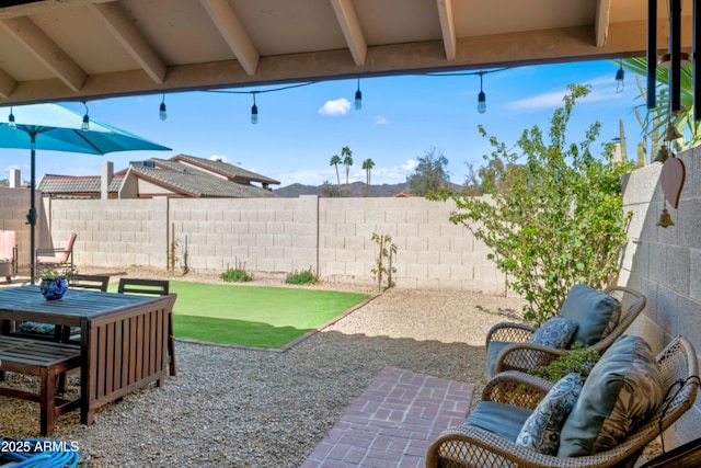 view of patio featuring a fenced backyard