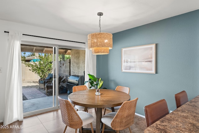 dining room with tile patterned flooring