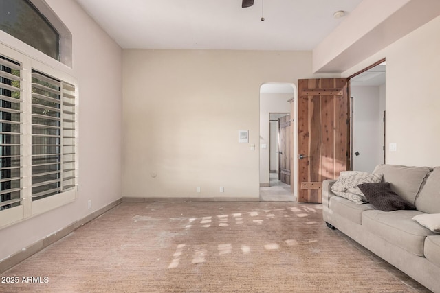 living room featuring ceiling fan