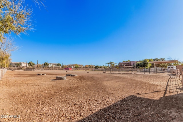 view of yard featuring a rural view