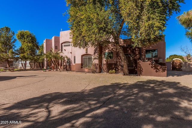 view of adobe home