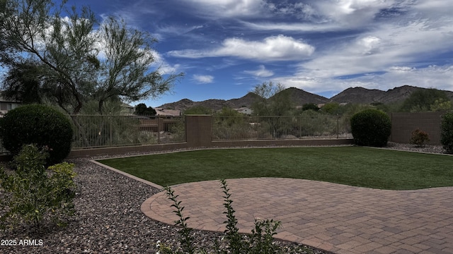 1854 W Fetlock Trl, Phoenix, AZ 85085 - view of yard with a patio and a mountain view