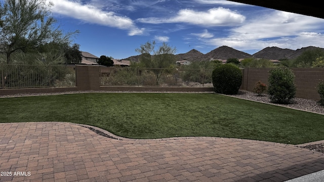 1854 W Fetlock Trl, Phoenix, AZ 85085 - view of yard with a patio area and a mountain view
