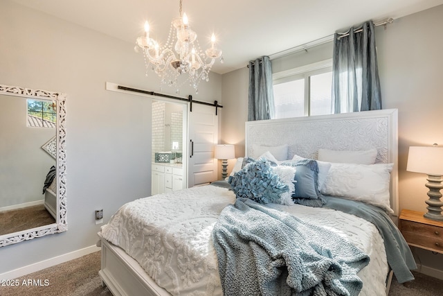 bedroom featuring ensuite bath, a barn door, a chandelier, and carpet floors