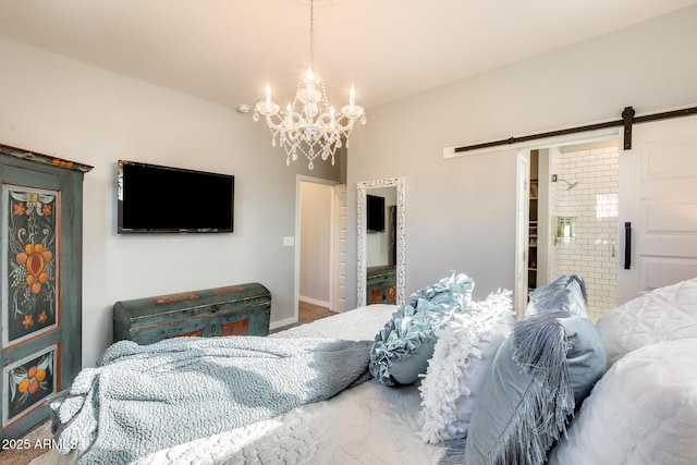 bedroom featuring carpet flooring, a notable chandelier, a barn door, and ensuite bathroom