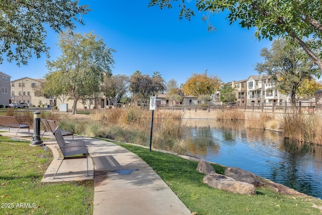 view of home's community featuring a water view