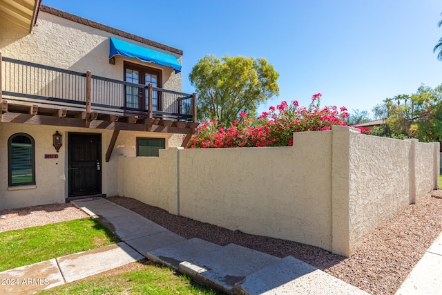 exterior space featuring a balcony