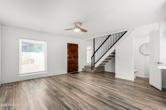 entrance foyer featuring ceiling fan and dark hardwood / wood-style flooring