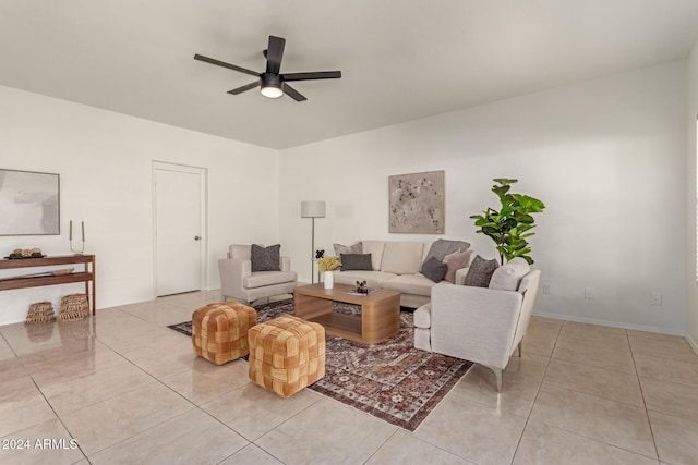 tiled living room with ceiling fan