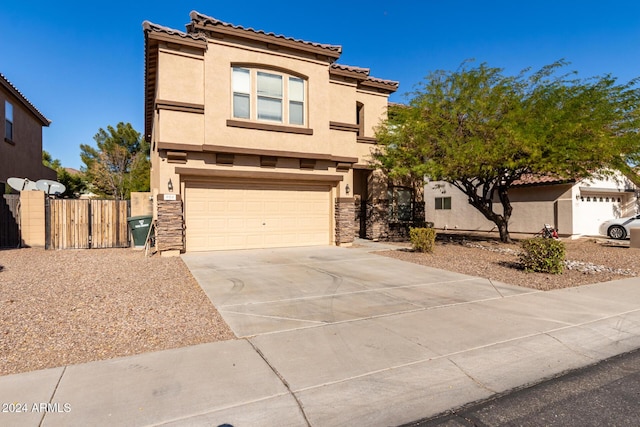 view of front of home with a garage