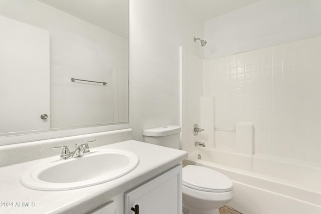 full bathroom with washtub / shower combination, vanity, and toilet