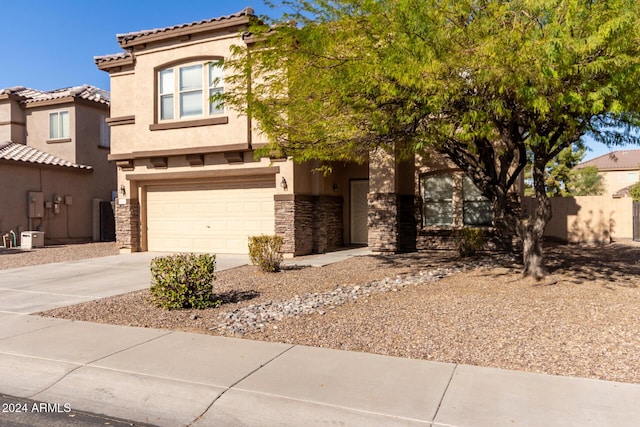 view of front of property featuring a garage