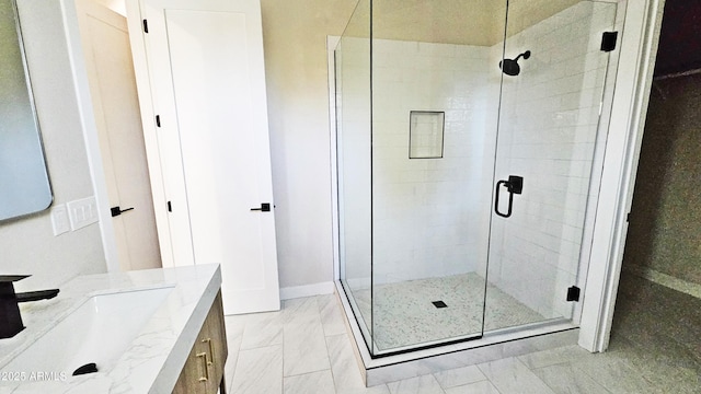 bathroom with vanity and walk in shower