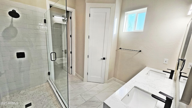 bathroom with vanity and walk in shower