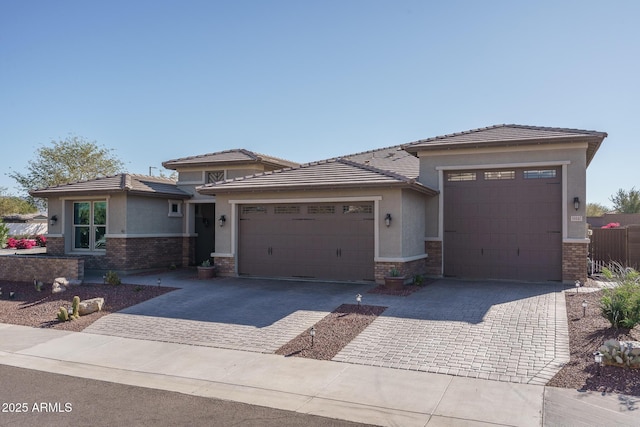 prairie-style house featuring a garage