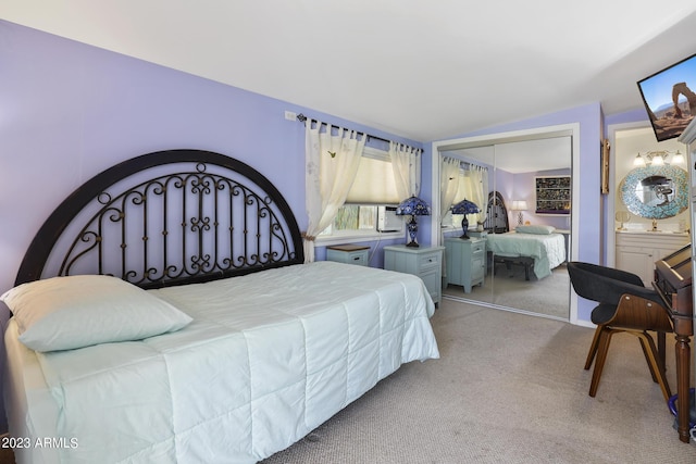 bedroom featuring a closet and carpet floors