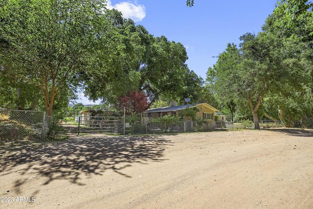 view of front of house with fence