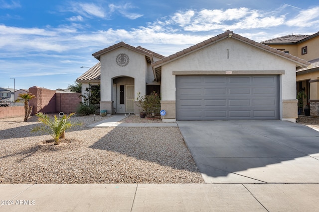 view of front of property featuring a garage