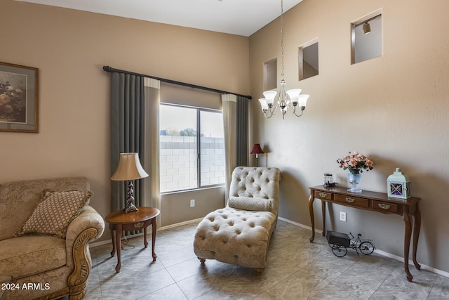 sitting room with a chandelier