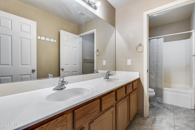 full bathroom featuring vanity, toilet, and shower / bath combo with shower curtain