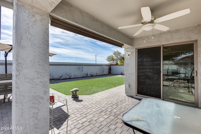 view of patio / terrace featuring ceiling fan