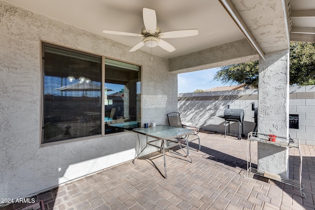 view of patio / terrace featuring ceiling fan