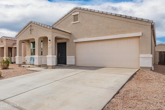 view of front of home with a garage