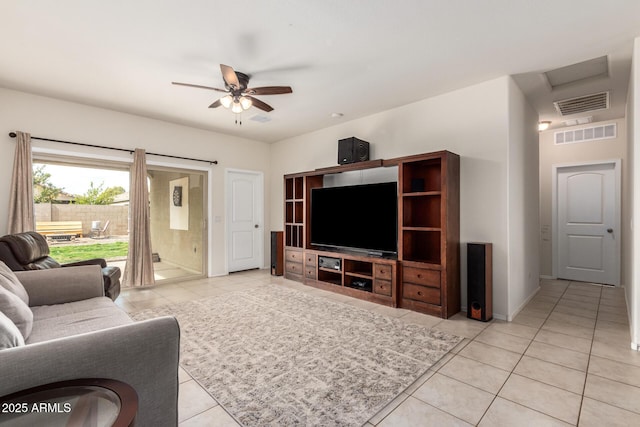 living room featuring ceiling fan and light tile patterned floors