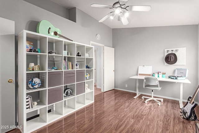 office with vaulted ceiling, wood finished floors, a ceiling fan, and baseboards