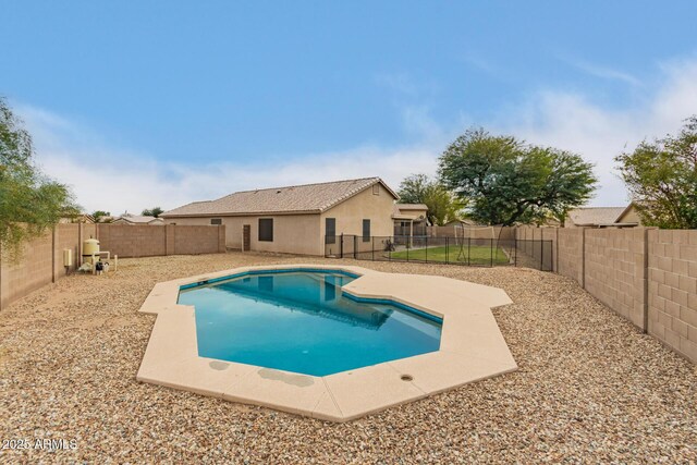 view of pool with a fenced backyard and a fenced in pool