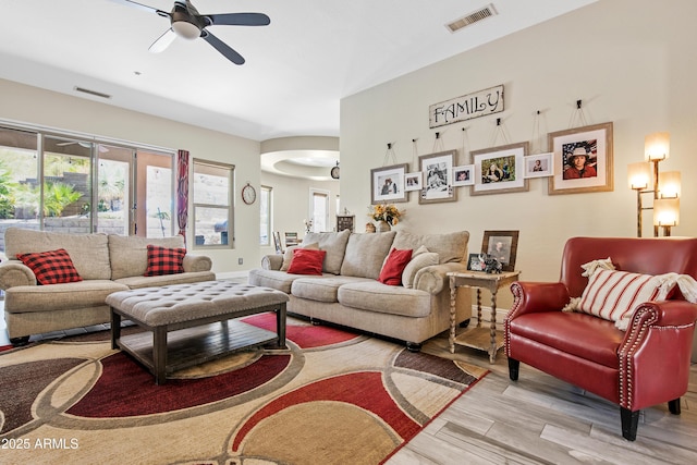 28019 N 115th Pl, Scottsdale, AZ 85262 - living area with ceiling fan, wood finished floors, and arched walkways