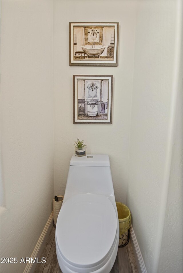 28019 N 115th Pl, Scottsdale, AZ 85262 - bathroom featuring baseboards, wood finished floors, and toilet