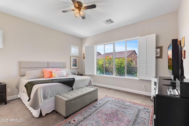 6948 E Quill St, Mesa, AZ 85207 - carpeted bedroom featuring baseboards and a ceiling fan