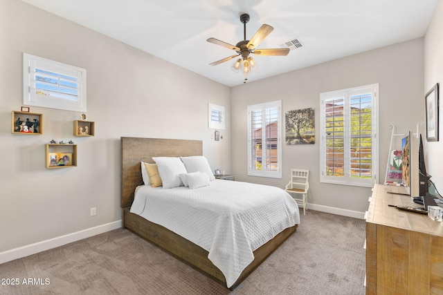 6948 E Quill St, Mesa, AZ 85207 - bedroom with baseboards, carpet flooring, and a ceiling fan