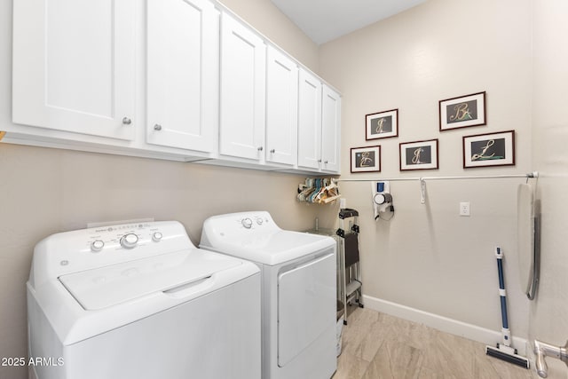 6948 E Quill St, Mesa, AZ 85207 - laundry area with washer and clothes dryer, cabinet space, and baseboards