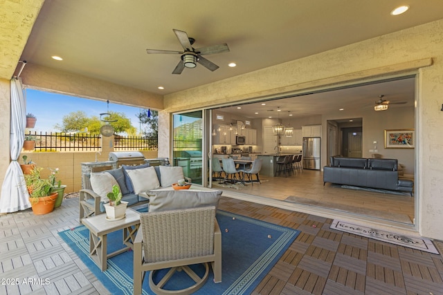 6948 E Quill St, Mesa, AZ 85207 - view of patio / terrace with ceiling fan and an outdoor living space