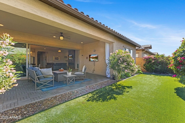 6948 E Quill St, Mesa, AZ 85207 - view of yard featuring a patio, outdoor lounge area, and a ceiling fan