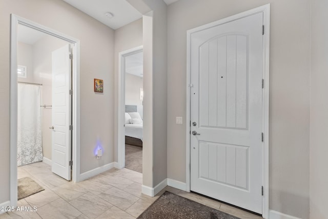 6948 E Quill St, Mesa, AZ 85207 - entrance foyer with light marble finish flooring and baseboards