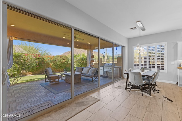 6948 E Quill St, Mesa, AZ 85207 - sunroom / solarium with a chandelier