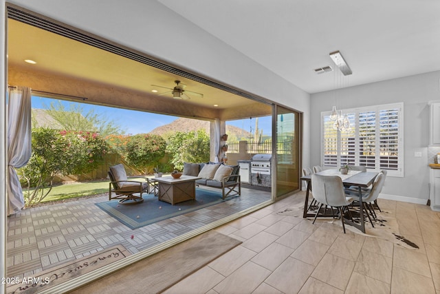 6948 E Quill St, Mesa, AZ 85207 - view of patio / terrace featuring an outdoor living space, outdoor dining space, and a ceiling fan