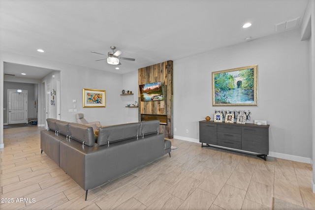 6948 E Quill St, Mesa, AZ 85207 - living room featuring ceiling fan, baseboards, and recessed lighting