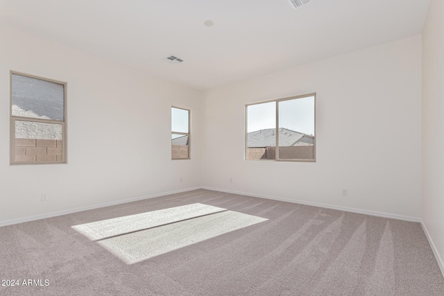 view of carpeted spare room